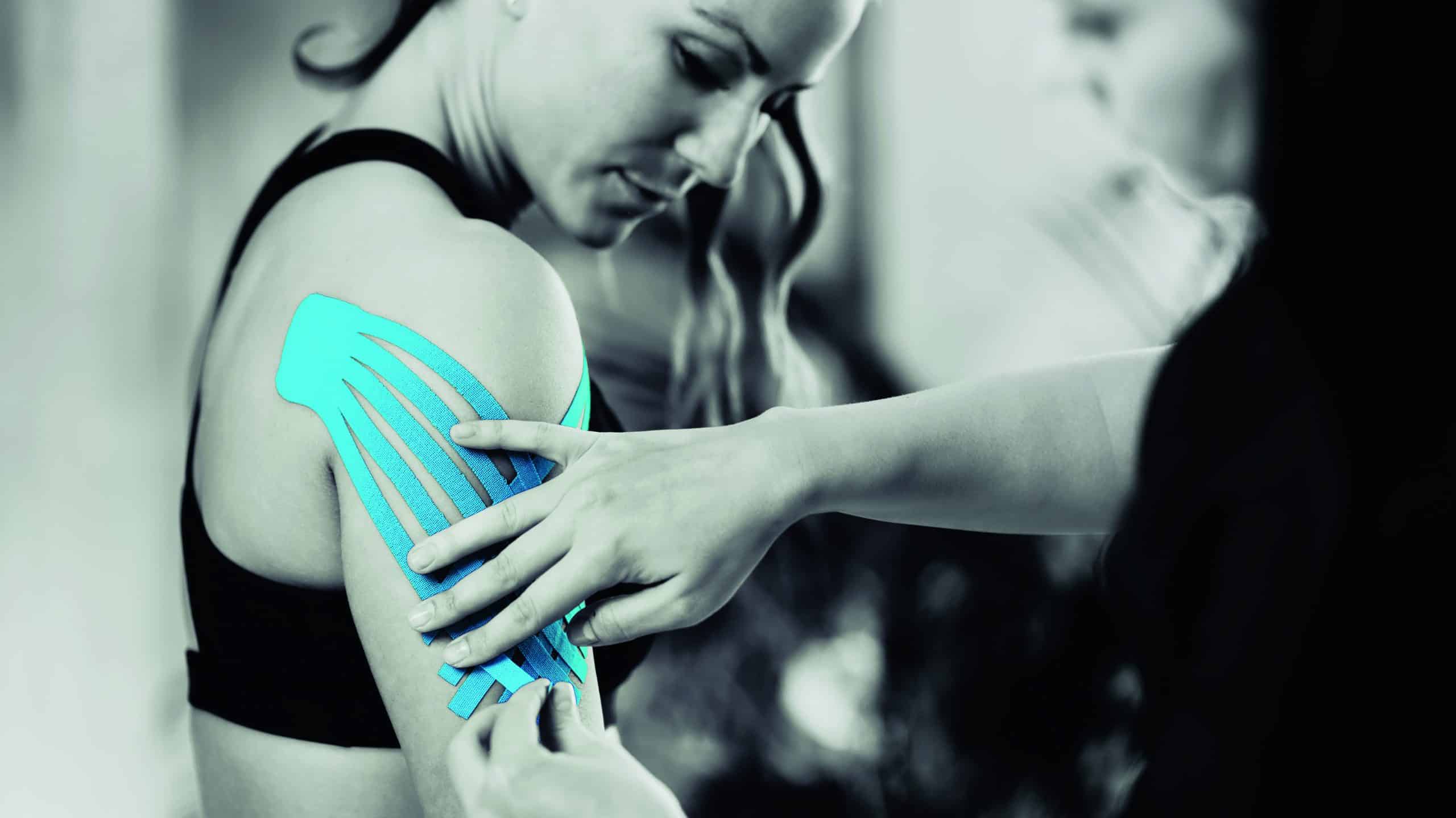 Shoulder Treatment With Blue Kinesiology Tape